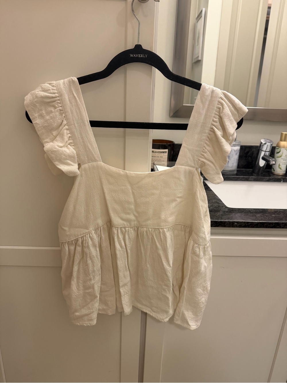 Cream Ruffle Sleeve Peplum Top